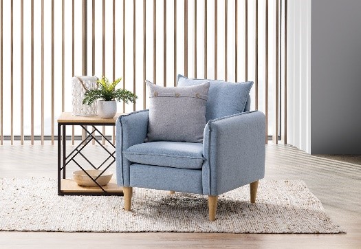 Blue Grey arm chair in neutral toned living room