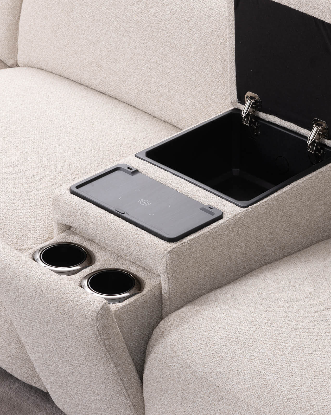 Fiorella recliner centre console with built-in wireless charging pad, cup holders, and hidden storage compartment.