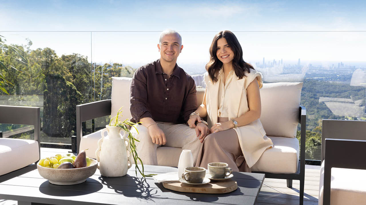 Couple relaxing on Conjola lounge suite